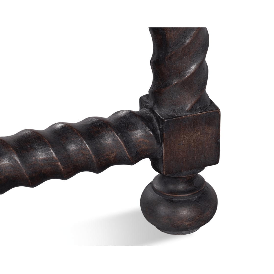 Close-up of table leg and foot detail.