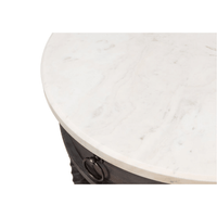 Close-up of marble top on side table.