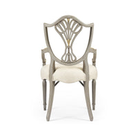 Back view of antique style shield back dining chair.