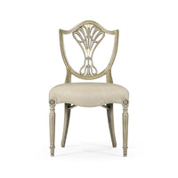 Shield back dining side chair, front view.
