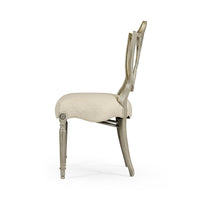 Shield back dining side chair, side profile.