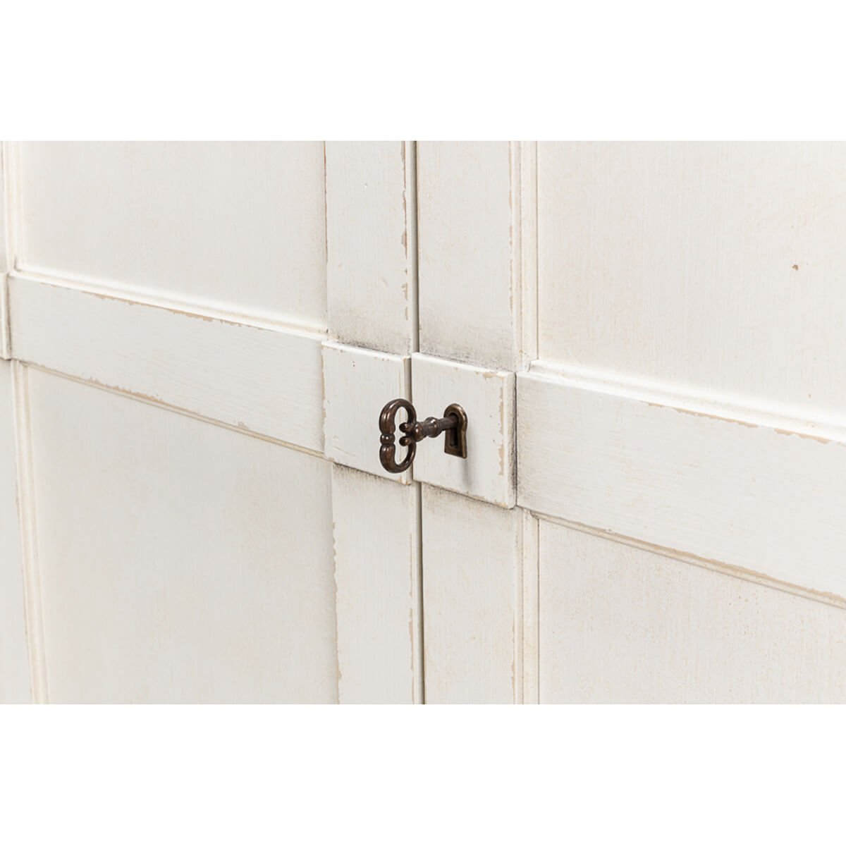 Close-up of sideboard door lock detail.