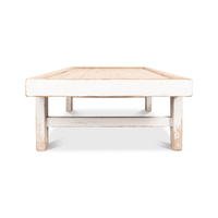 Straight-on end view of farmhouse coffee table.