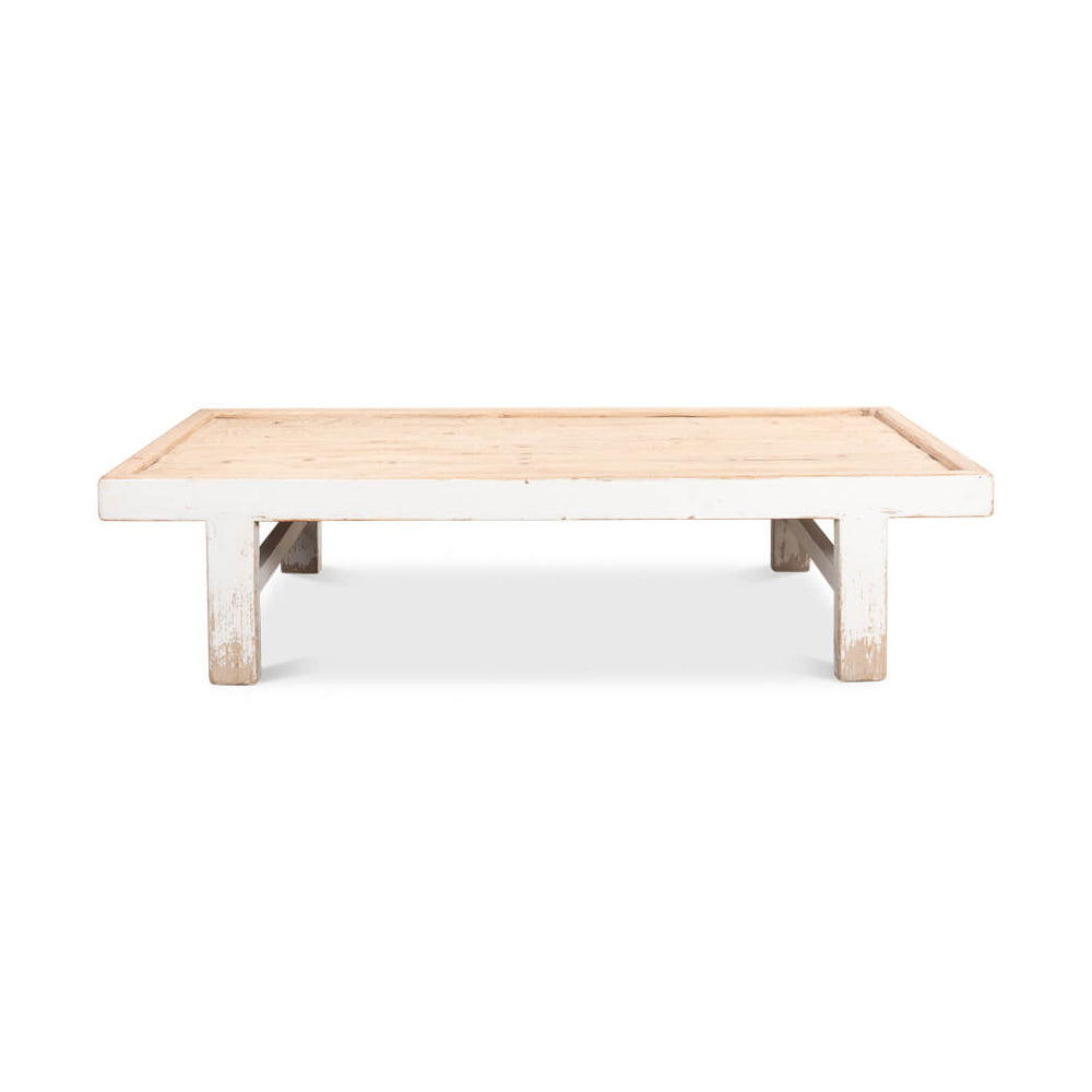Front view of antique white farmhouse coffee table.