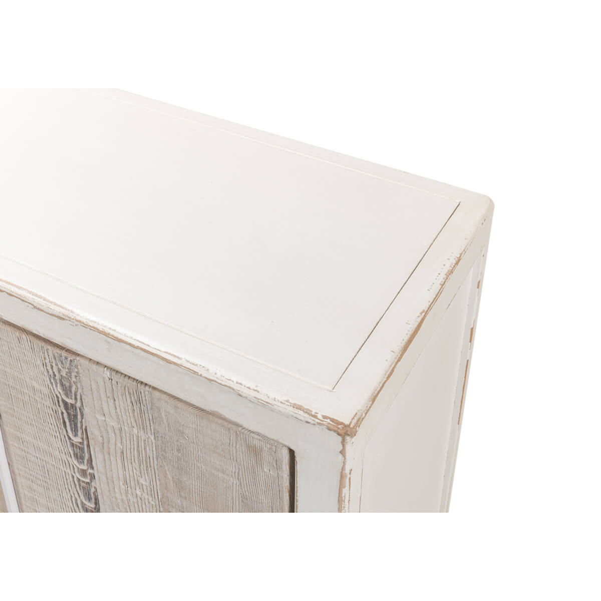 Close-up of white sideboard corner detailing.