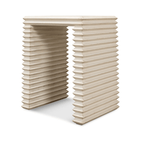 Side angle of antique white stacked side table.