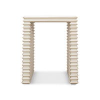 Back view of antique white stacked side table.