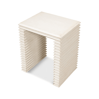 Elevated view of antique white stacked side table.