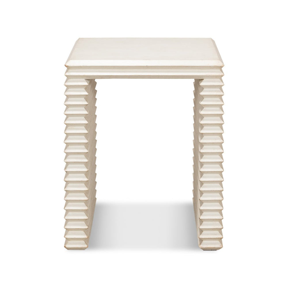 Front view of antique white stacked side table.