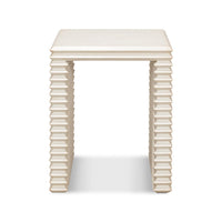 Front view of antique white stacked side table.