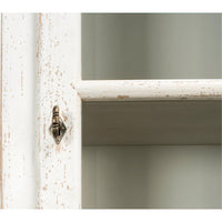 Latch detail on vintage-style rustic white bookcase.
