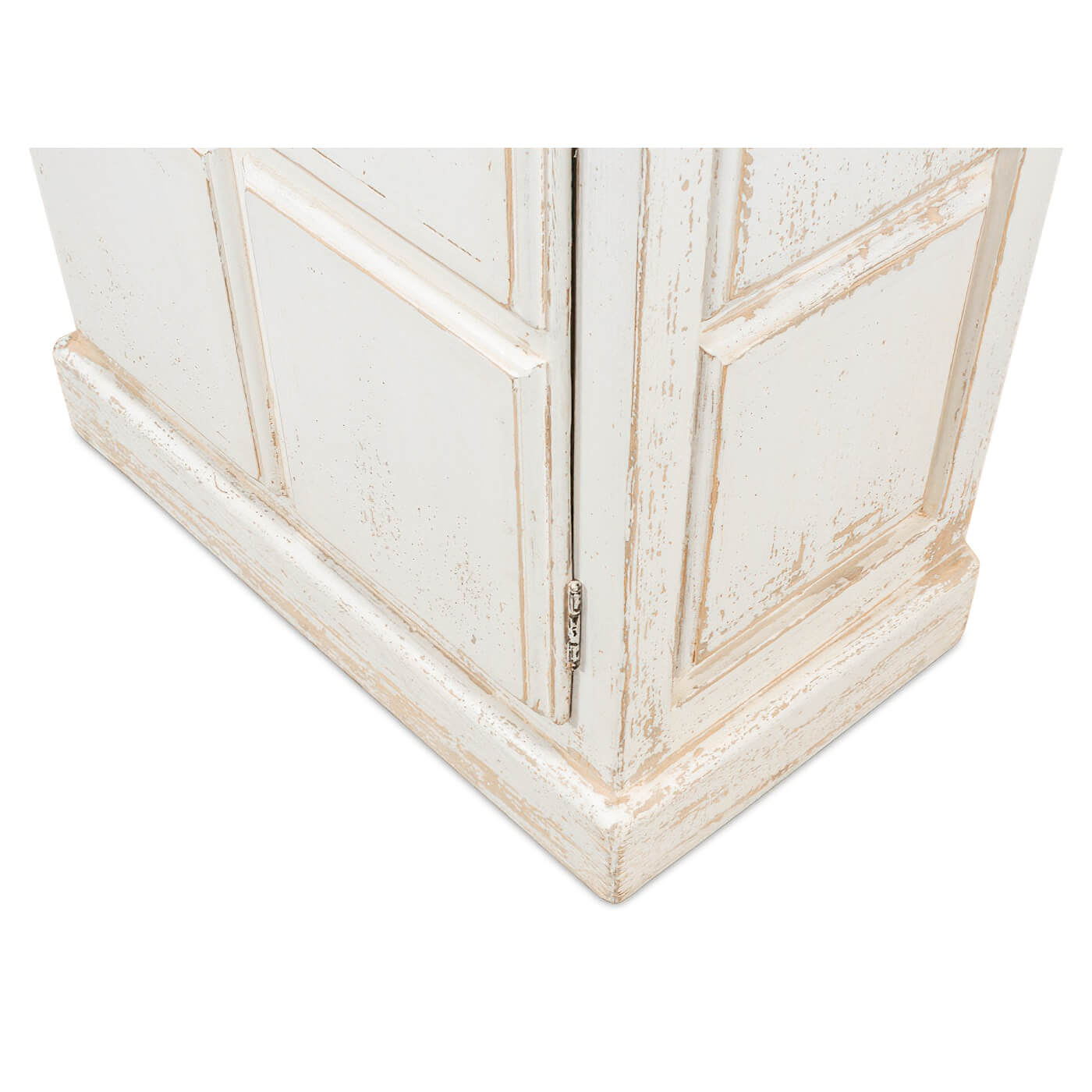 Base close-up of rustic white bookcase, panel details.