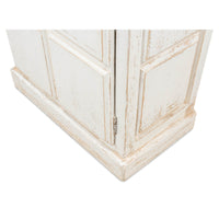 Base close-up of rustic white bookcase, panel details.