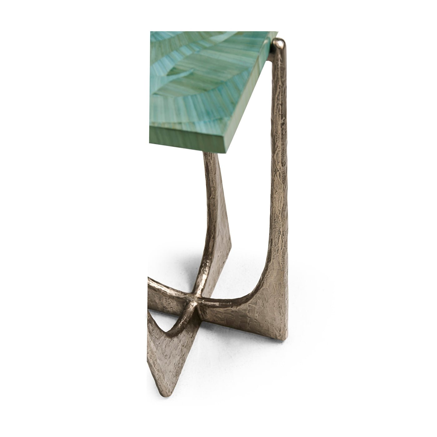 Close-up of table’s leg and top intersection.