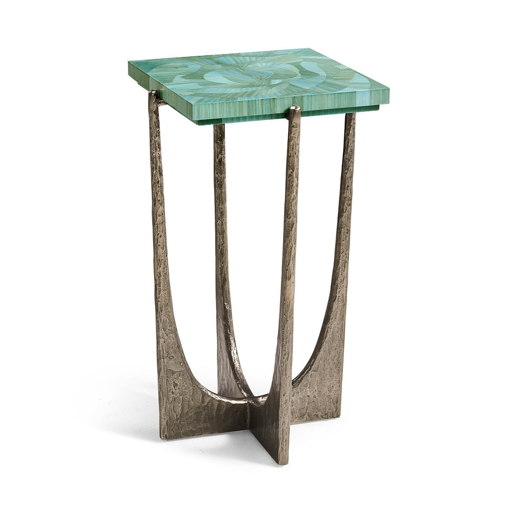 Side view of square accent table with green top.