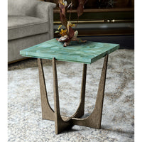 End table in living room setting, decorative vase on top.