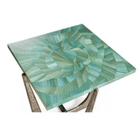 Angled view of green patterned table top.
