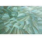Close-up of intricate green surface design on table.