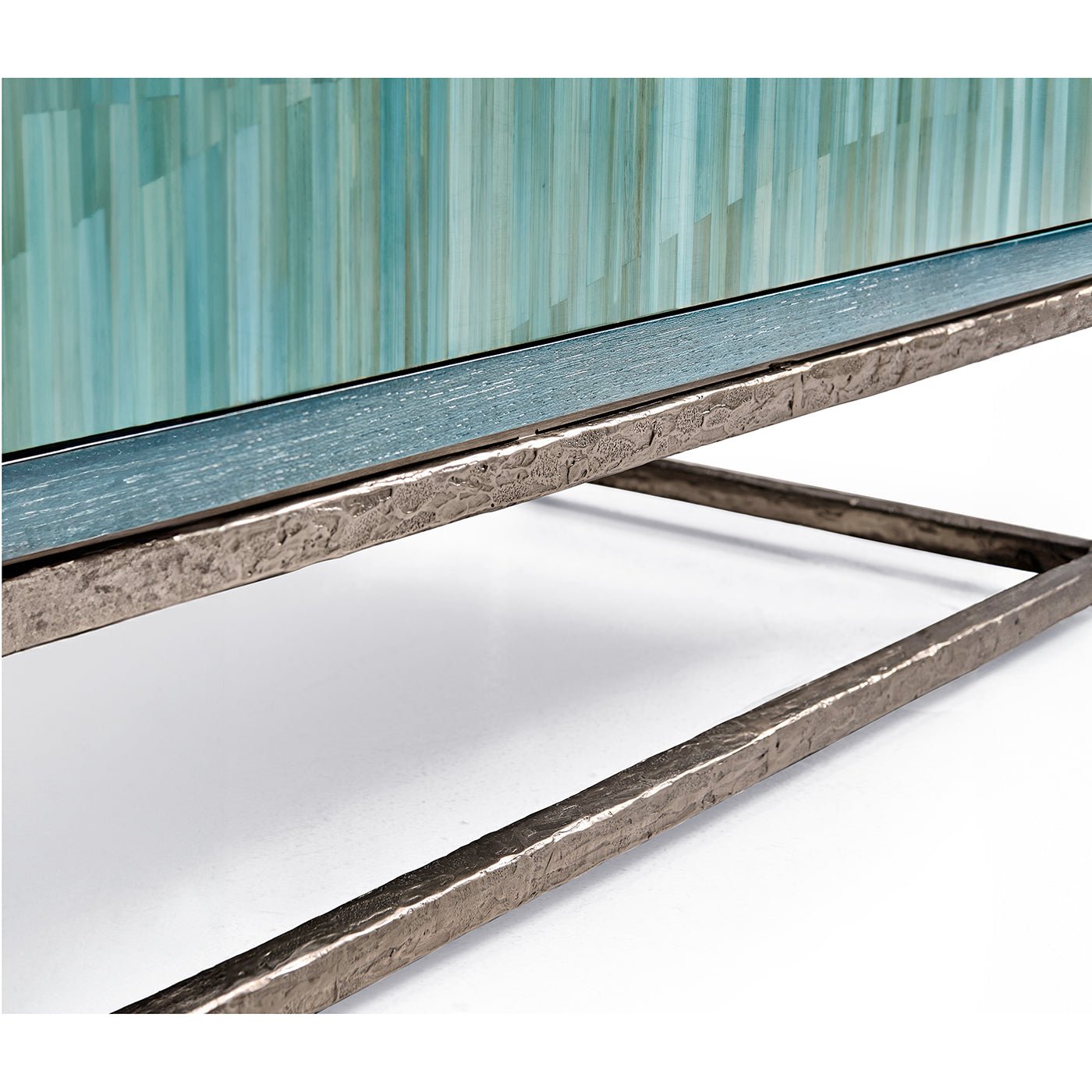 Base detail of Aqua Mist chest of drawers.