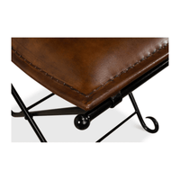 Close-up of leather stool detailing corner stitching.