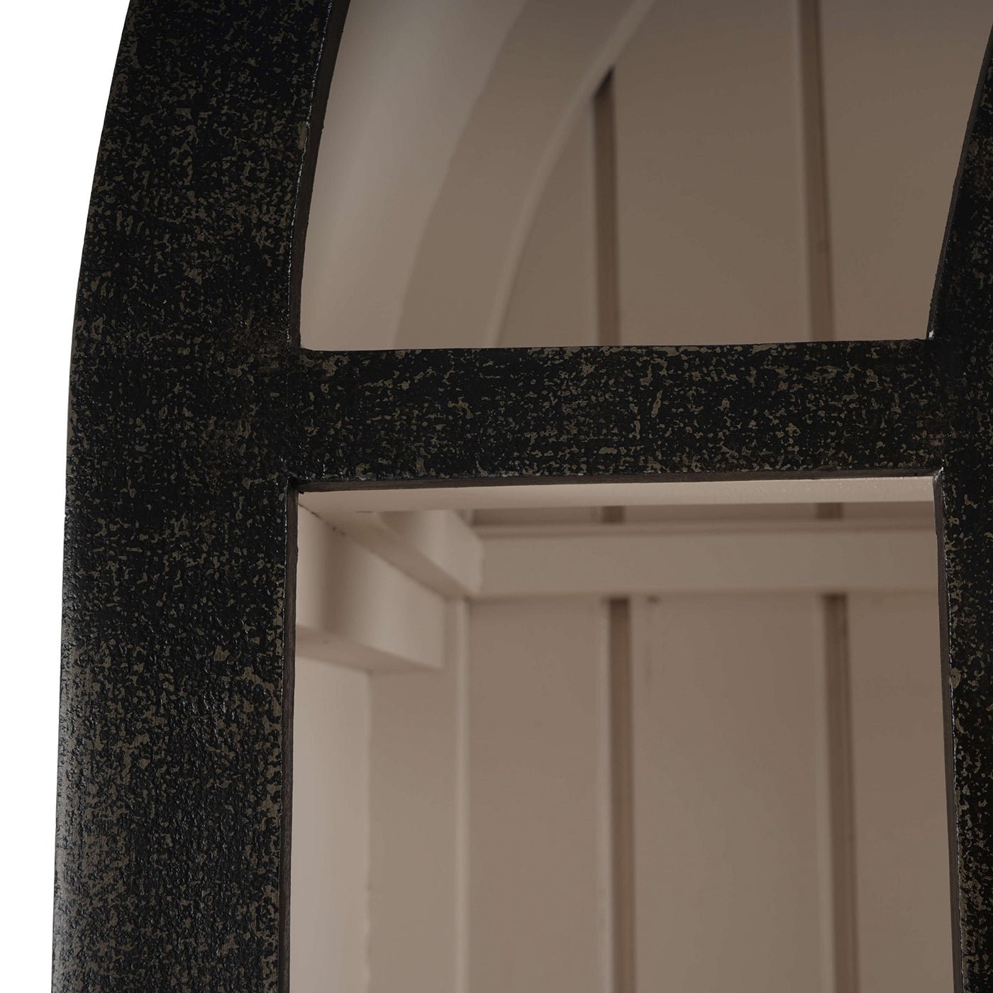 Close-up arched display cabinet frame, texture detail.