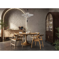 Dining room with arched top china cabinet.