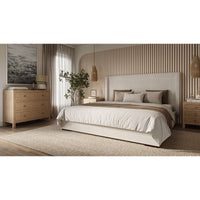 Modern bedroom decor with white upholstered king bed.