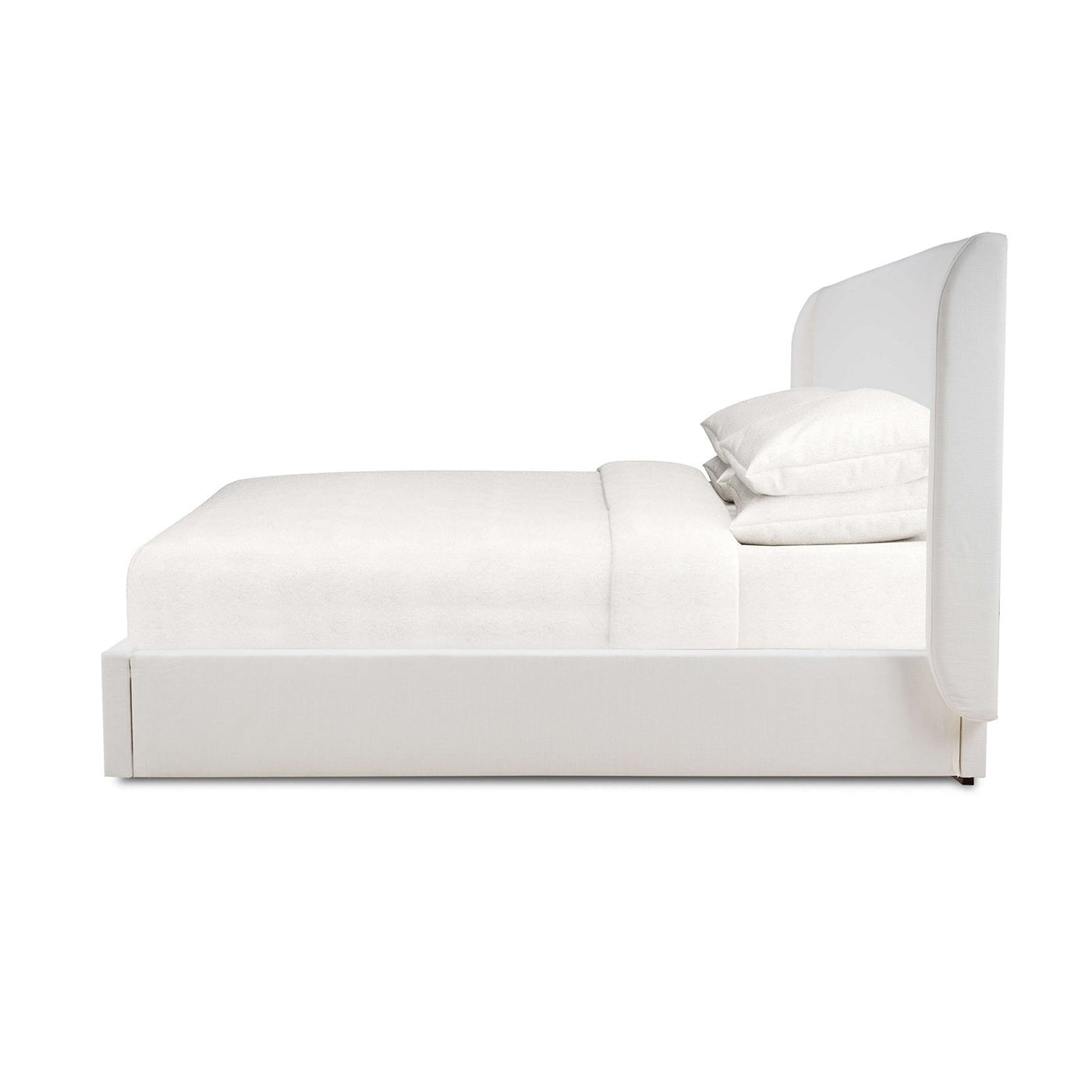 Arctic white upholstered queen bed side view.