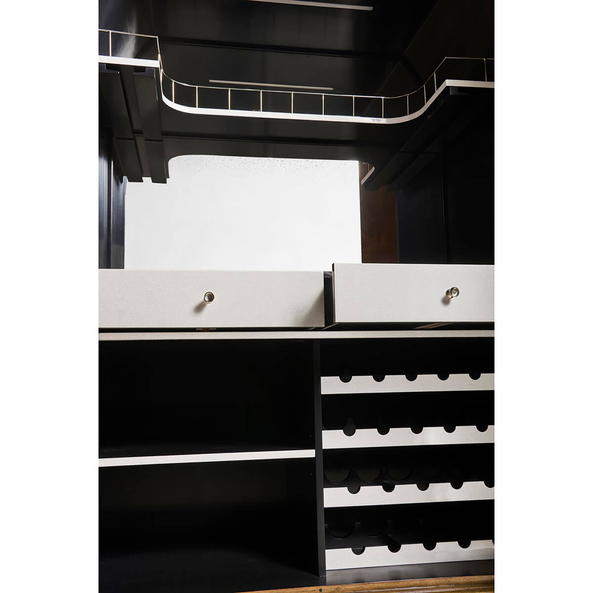 Interior shelving of Art Deco bar cabinet.
