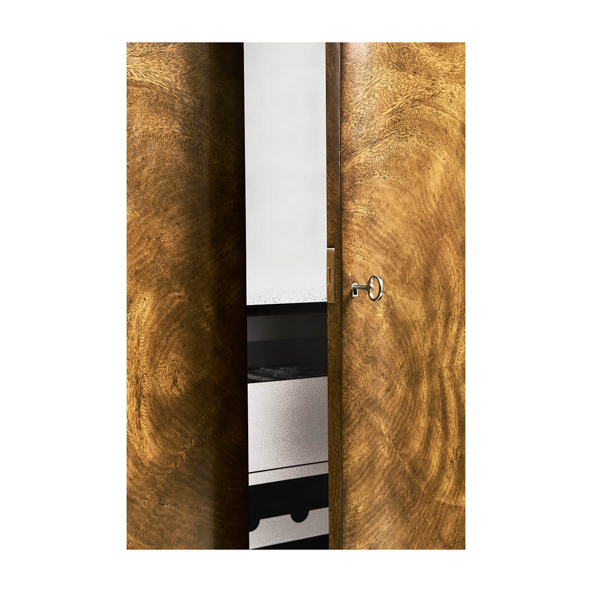 Close-up of closed Art Deco bar cabinet lock.