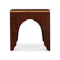 Side view showing arch design of stool.