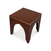 Top angled perspective of crocodile pattern stool.