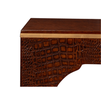 Detailed corner texture of brandy crocodile stool.