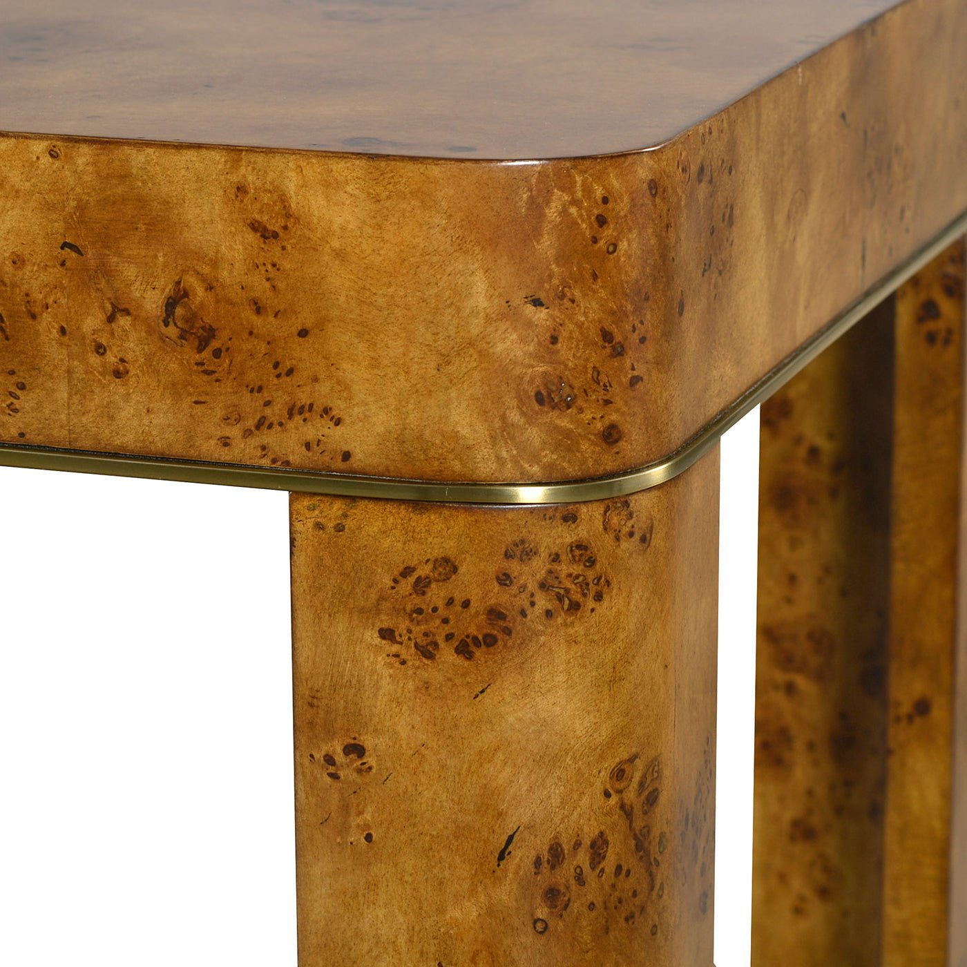 Detailed corner view showing burl console table finish.