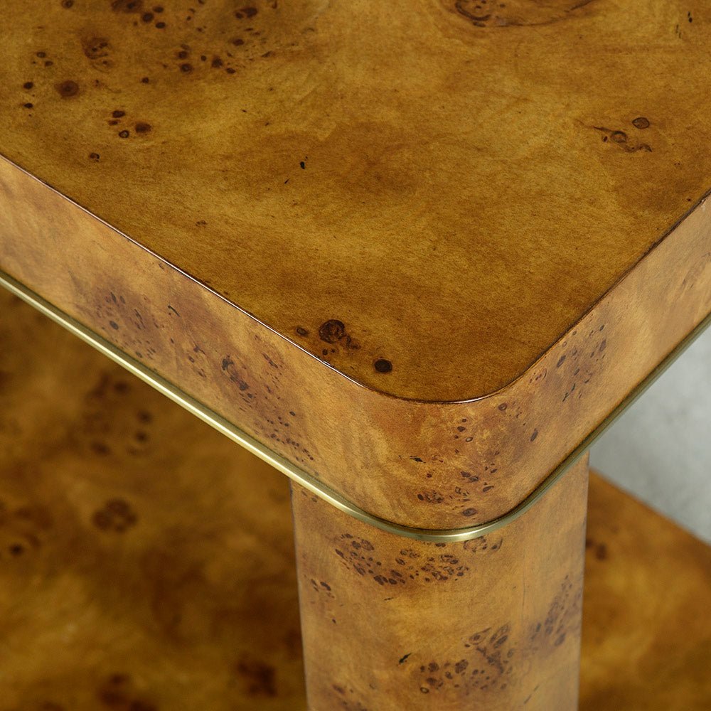 Close-up of burl console table corner and texture.