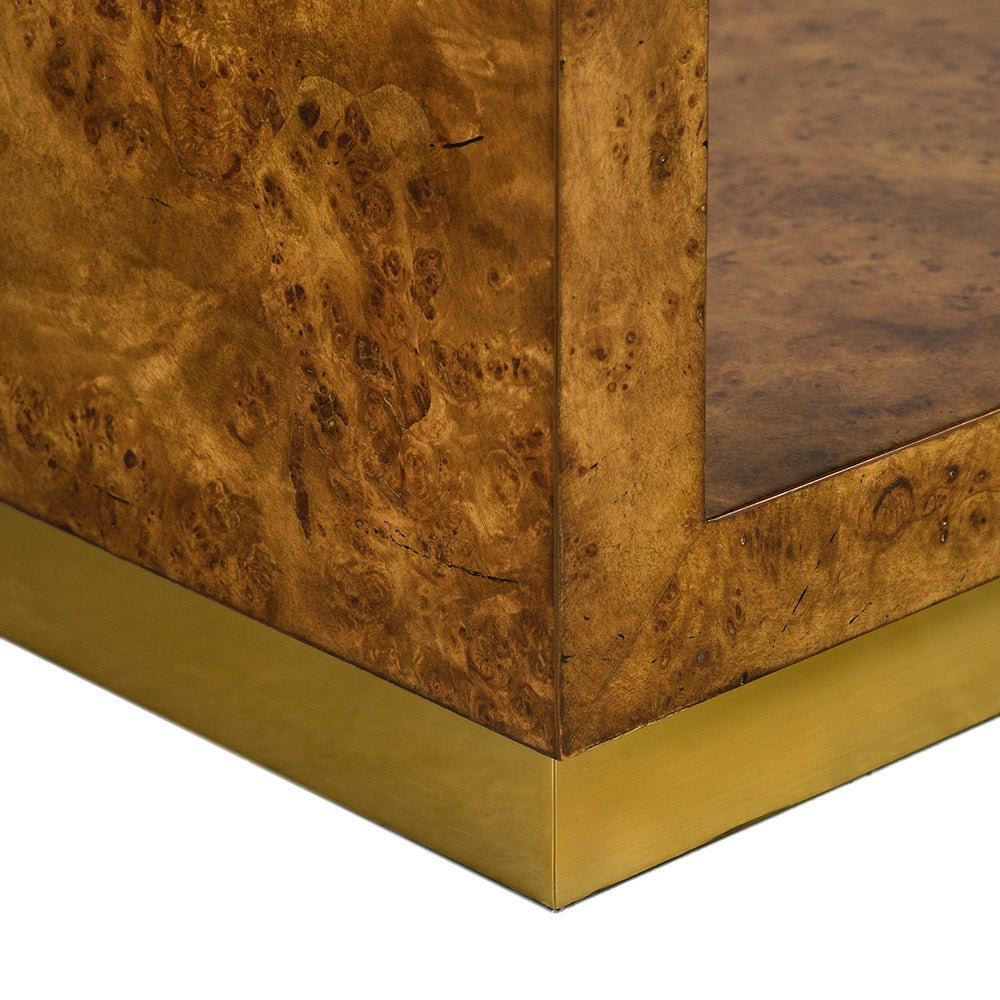 Corner detail of burl and brass etagere base.