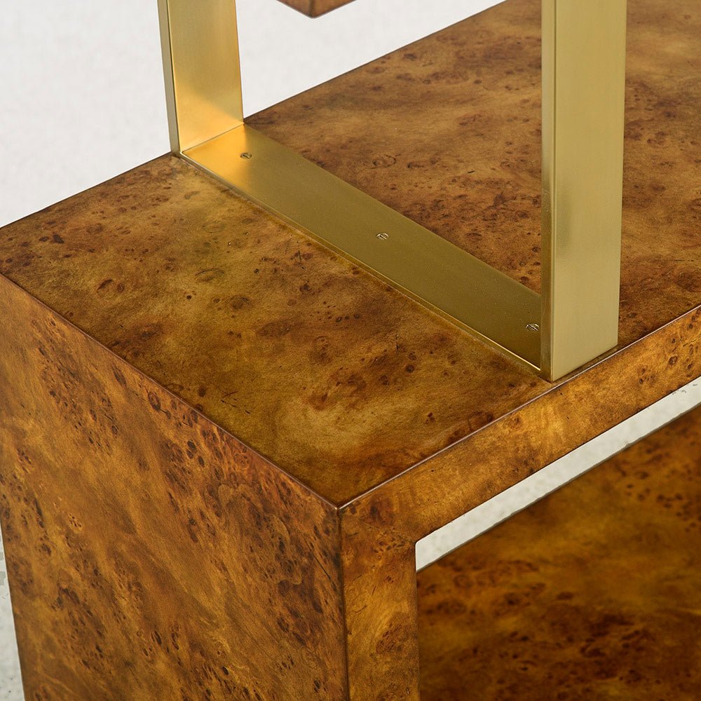 Close-up of burl and brass detail on etagere shelf.