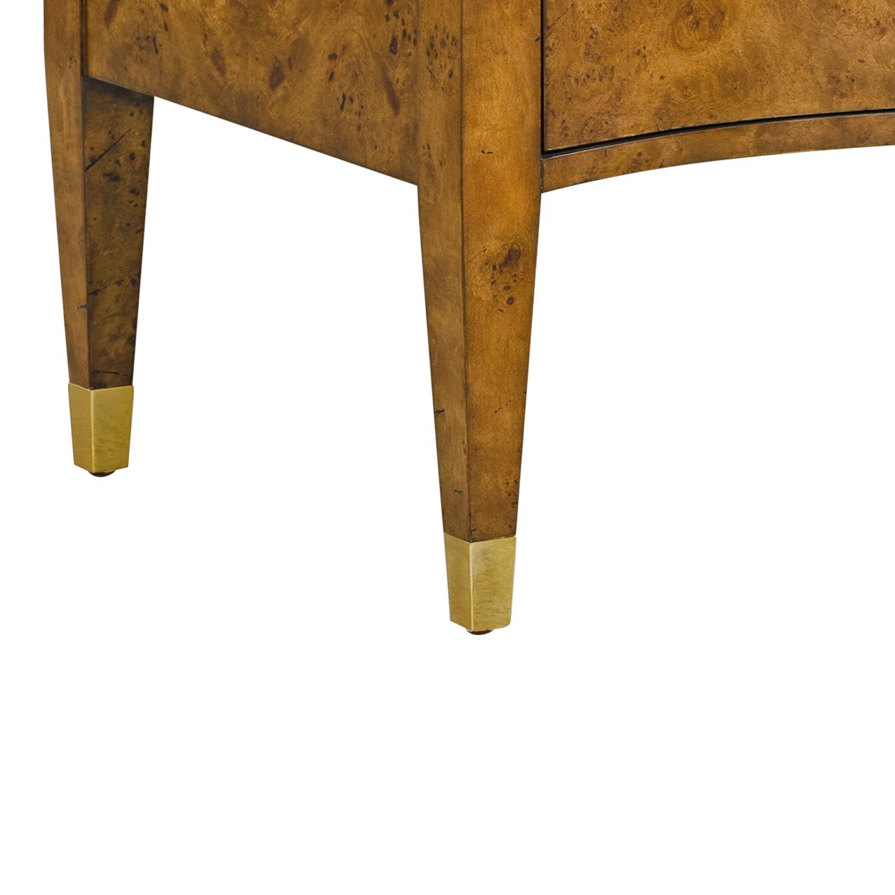 Nightstand's leg detail with gold accent.