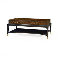 Angled view of burl walnut coffee table, front left.