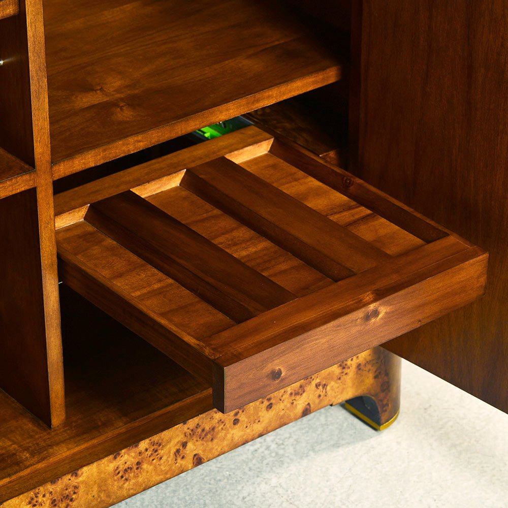 Pull-out shelf in Art Deco bar cabinet interior.