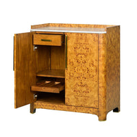 Art Deco bar cabinet side open with drawers shown.