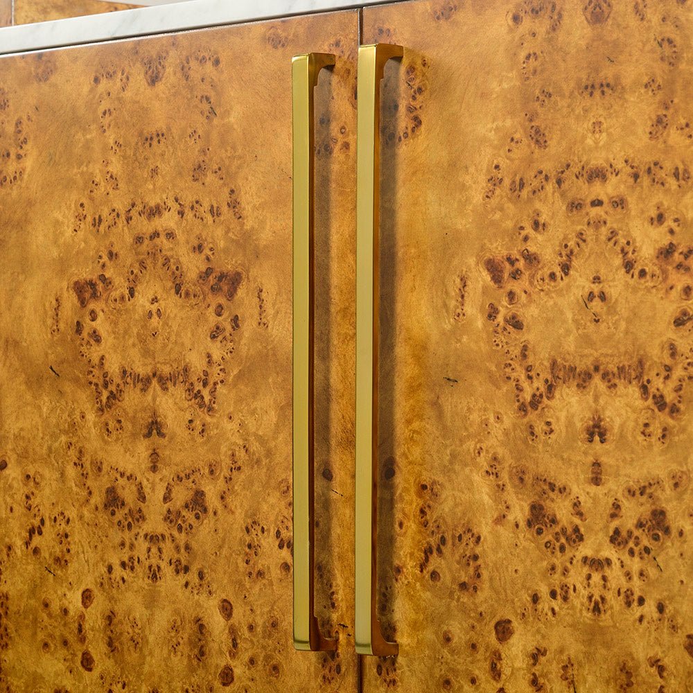 Close-up of Art Deco bar cabinet handles.