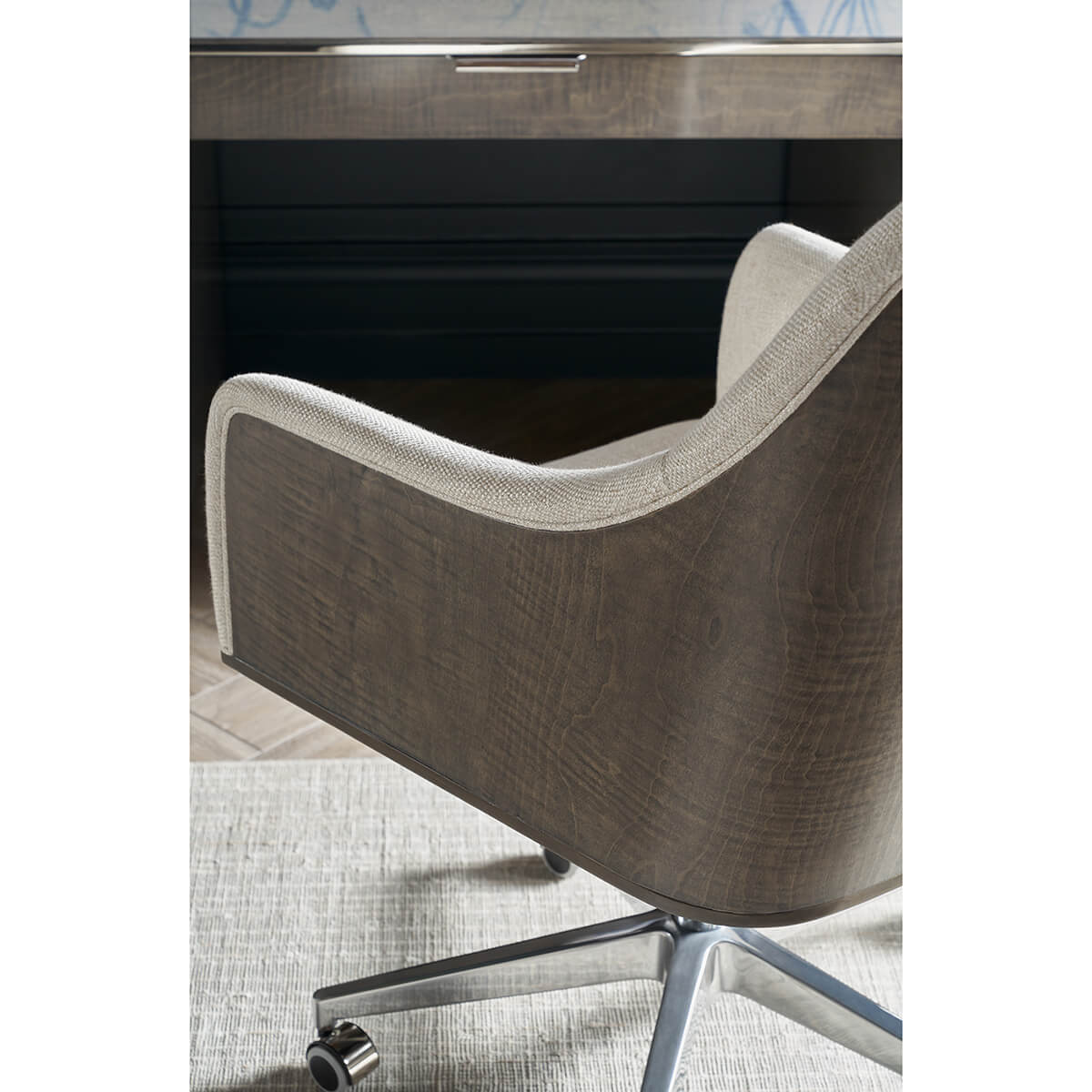 Close-up of Art Deco desk chair armrest and texture.