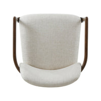 Top view of beige dining armchair with fabric seat.