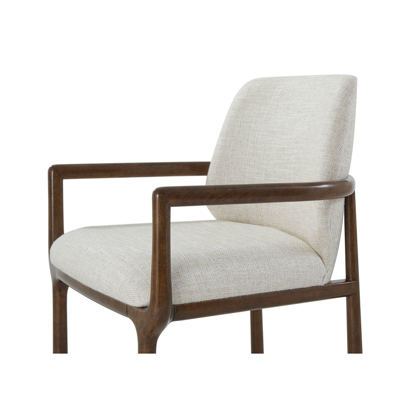 Close-up of beige dining armchair, wooden armrest detail.