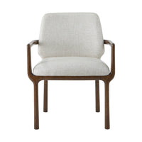 Front view of beige dining armchair with wooden arms.