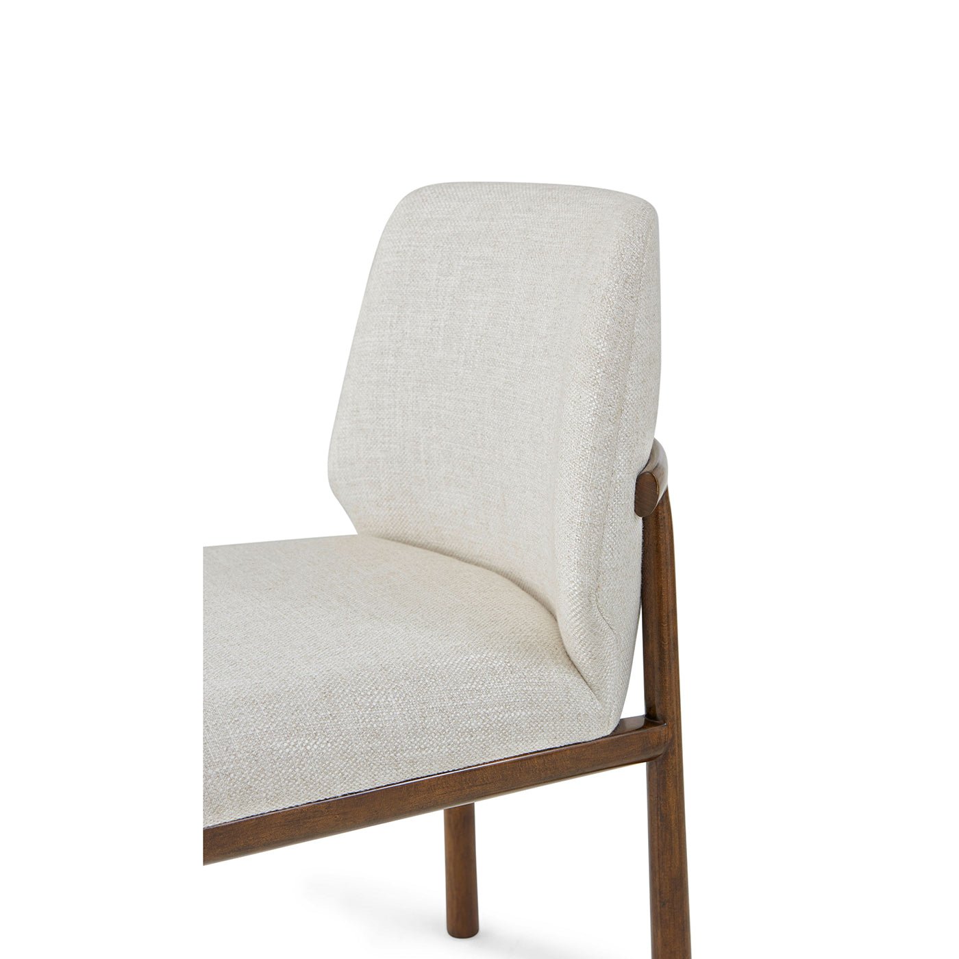 Detailed view of dining chair backrest and cushion.