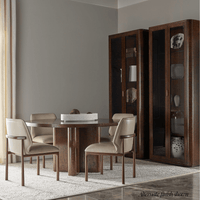Dining room with beige chairs and wooden table.