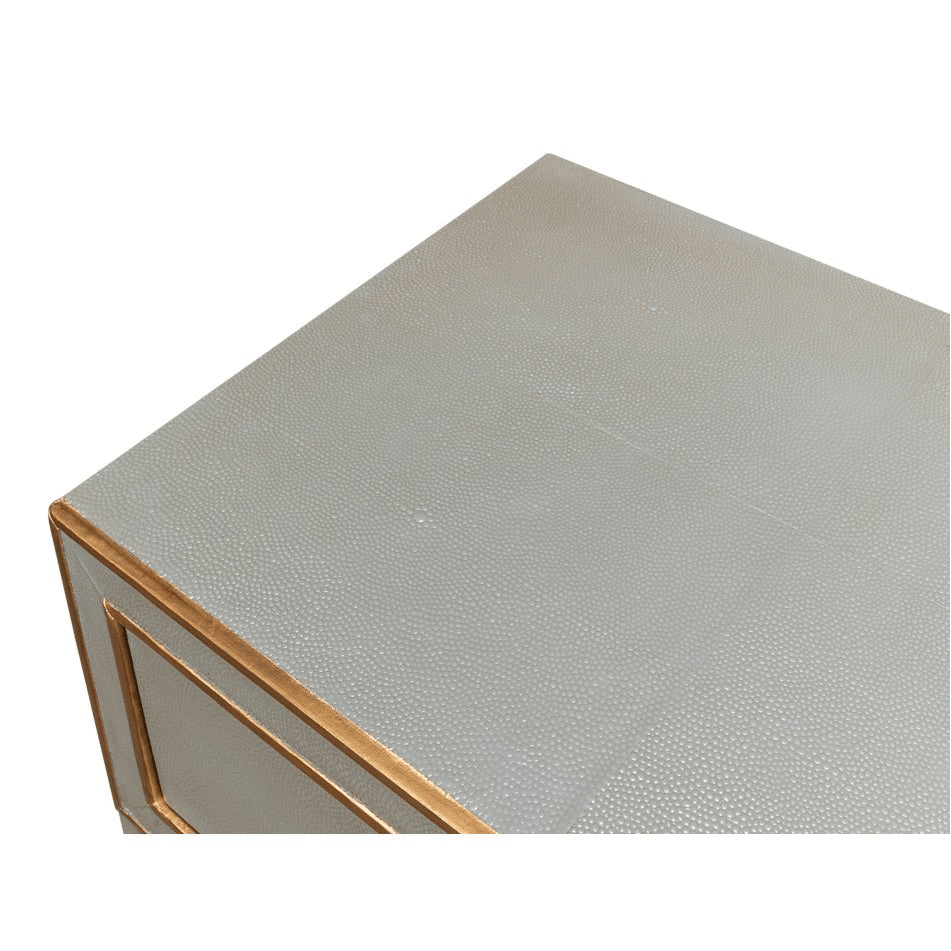 Textured surface detail on grey nightstand top.