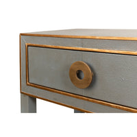 Close-up of nightstand drawer and handle detail.